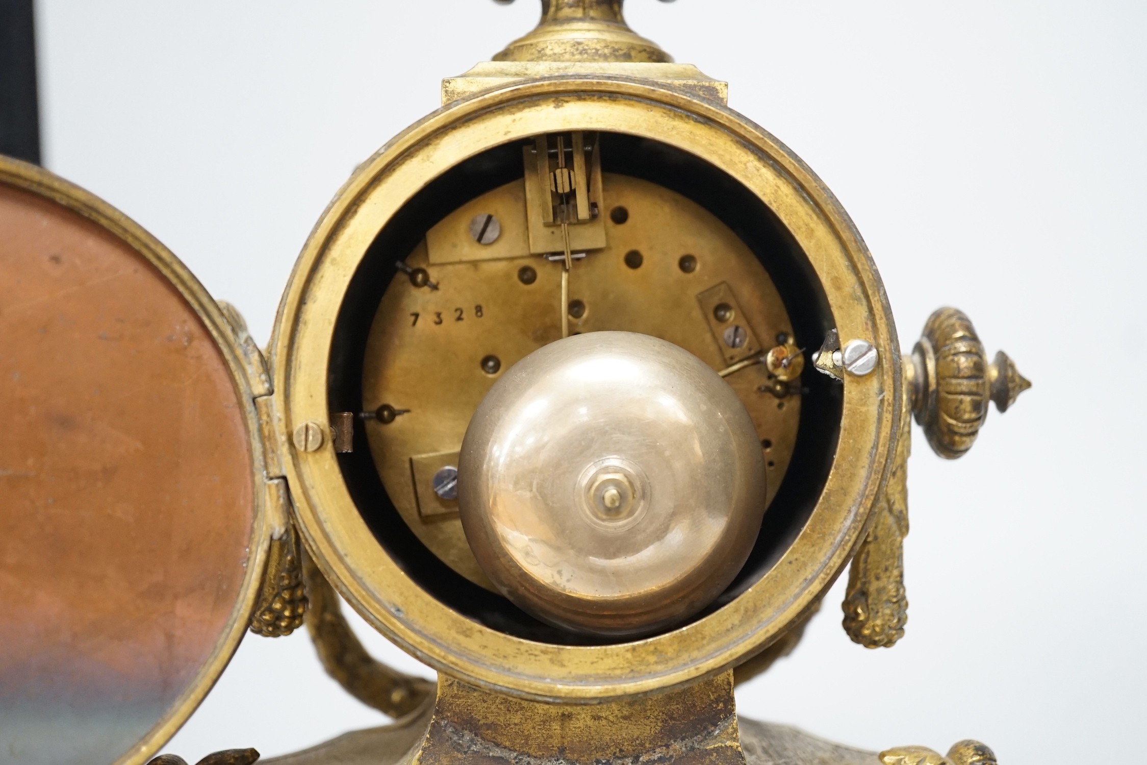 A 19th century French gilt-brass mantel clock with Sevres-style panels, 33cm